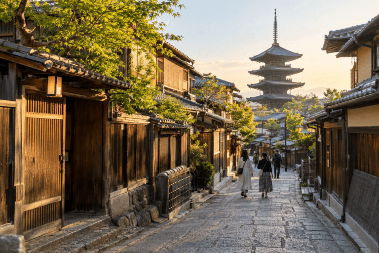 Photorealistic early-morning view of a stone-paved Higashiyama lane in Kyoto with traditional wooden houses and Yasaka Pagoda