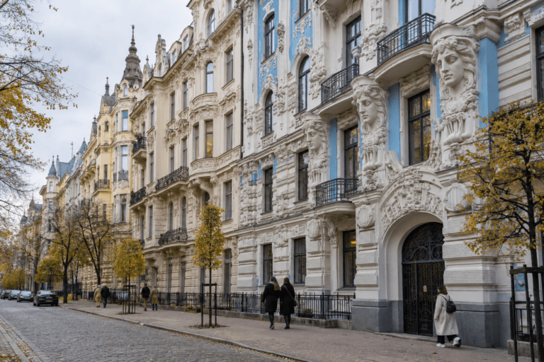 Photorealistic view of ornate Art Nouveau façades and autumn trees on Alberta Street in Riga